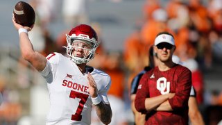 Spencer Rattler #7 of the Oklahoma Sooners warms up before the game against the Texas Longhorns during the 2021 AT&T Red River Showdown at Cotton Bowl on Oct. 9, 2021 in Dallas, Texas.