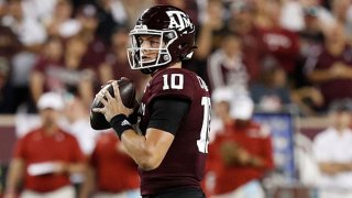 Zach Calzada #10 of the Texas A&M Aggies looks for a receiver in the first quarter against the Alabama Crimson Tide at Kyle Field on Oct. 9, 2021 in College Station, Texas.