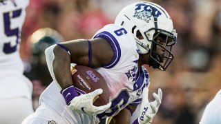 Running back Zach Evans #6 of the TCU Horned Frogs runs the ball during the first half of the college football game against the Texas Tech Red Raiders at Jones AT&T Stadium on Oct. 9, 2021 in Lubbock, Texas.