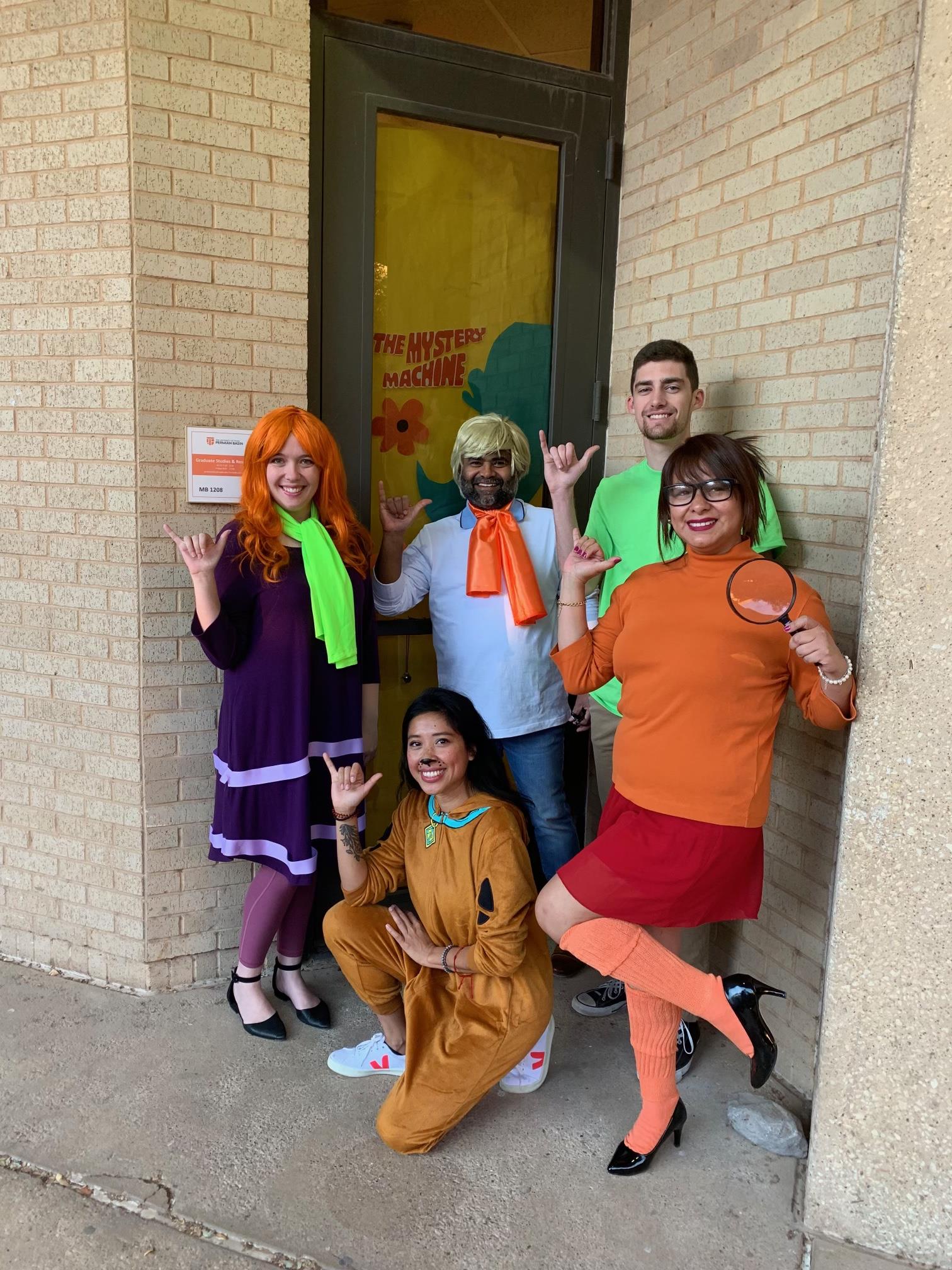 Office workers at UTPB in Odessa, TX  Dressed as Scooby-Doo characters.