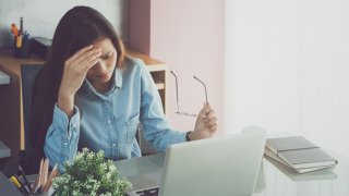 Sad Woman By Laptop On Table