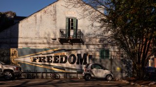 Homer Plessy Freedom Sign Painted On School Fence