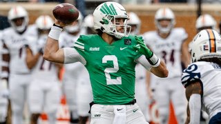 North Texas Mean Green quarterback Austin Aune (2) looks downfield for an open receiver during the game between the North Texas Mean Green and the UTSA Roadrunners on November 27, 2021 at Apogee Stadium in Denton, Texas.