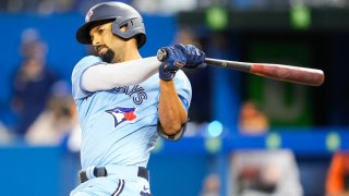 Marcus Semien #10 of the Toronto Blue Jays swings against the Baltimore Orioles in the first inning during their MLB game at the Rogers Centre on October 3, 2021 in Toronto, Ontario, Canada.