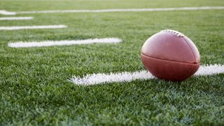 Closeup of a football on a field