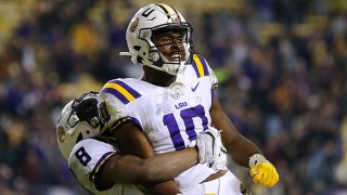 Jaray Jenkins #10 of the LSU Tigers celebrates a late fourth quarter touchdown to take the lead against the Texas A&M Aggies at Tiger Stadium on Nov. 27, 2021 in Baton Rouge, Louisiana.