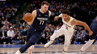 Luka Doncic #77 of the Dallas Mavericks drives to the basket against Josh Hart #3 of the New Orleans Pelicans in the first half at American Airlines Center on Nov. 8, 2021 in Dallas, Texas.