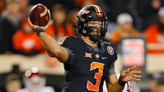 Quarterback Spencer Sanders #3 of the Oklahoma State Cowboys throws against the Oklahoma Sooners near the start of the first quarter at Boone Pickens Stadium on Nov. 27, 2021 in Stillwater, Oklahoma.