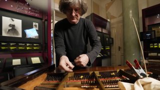Texas-born expert on historic pianos, Paul McNulty, renovates the last piano that Frederic Chopin played and composed on, at the Chopin museum in Warsaw, Poland, on Thursday, Dec. 9, 2021. T