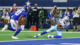 Amari Cooper #19 of the Dallas Cowboys scores a touchdown