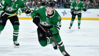 Jacob Peterson #40 of the Dallas Stars handles the puck against the Arizona Coyotes at the American Airlines Center on Dec. 6, 2021 in Dallas, Texas.