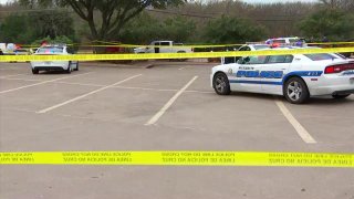 Mesquite police investigate the scene of the shooting involving an officer Friday.