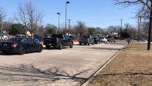 Cars lined up at the Ellis Davis Field House Covid-19 testing site