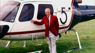 Gary DeLaune with the station's helicopter