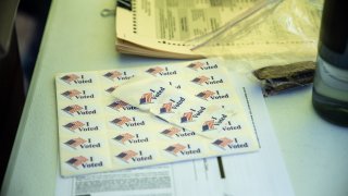 People Go To The Polls On First Day Of Early Voting In Texas