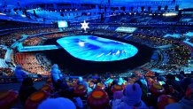 Citizens enter the "Birds Nest" National Stadium to watch the closing ceremony of the 2022 Beijing Winter Olympic Games, Feb. 20, 2022 in Beijing, China.