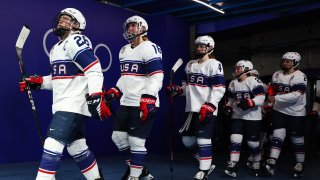 Team USA women's hockey walks out to the ice