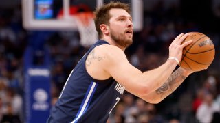 Luka Doncic #77 shoots the ball against against the Los Angeles Clippers in the first half at American Airlines Center on February 10, 2022 in Dallas, Texas. Doncic scored a career high 51 points and the Mavericks won 112-105.