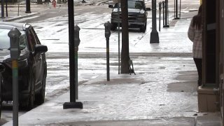 As temperatures dropped into the teens Friday morning, the sleet, snow and ice that previously melted refroze, making a mess of roads.