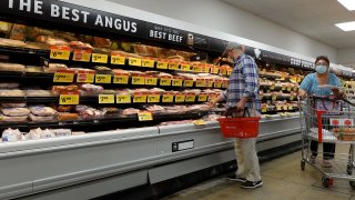 Customers shop at at a grocery store on February 10, 2022 in Miami, Florida. The Labor Department announced that consumer prices jumped 7.5% last month compared with 12 months earlier, the steepest year-over-year increase since February 1982.