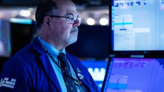 Traders on the floor of the NYSE, March 1, 2022.