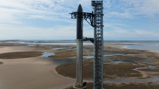 Starship prototype 20 stacked on top of Super Heavy booster 4 at the company’s facility in Boca Chica, Texas.