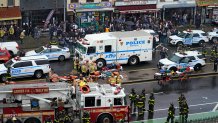 Police and first responders gather at the 36th Street subway station in the Brooklyn neighborhood of Sunset Park, April 12, 2022, in New York.