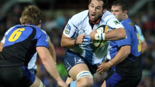 FILE – Pedrie Wannenburg of the Bulls of South Africa, right, is tackled by Australia’s Western Force player Ben McCalman during their Super 14 rugby union match in Perth, Australia, March 27, 2010. Pedrie Wannenburg, a former South Africa rugby player, has died after his car was struck by a teenage driver who was fleeing from police outside Houston. He was 41. South Africa Rugby announced Wannenburg’s death on Saturday April 23, 2022.