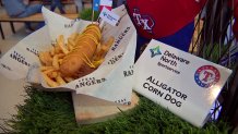 Alligator Corn Dog: An Alligator Andouille Sausage hand-dipped in corn dog batter and fried to a delicious golden brown. Available at the Bullpen Grill at Section 125.