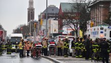 Police and first responders gather at the 36th Street subway station in the Brooklyn neighborhood of Sunset Park, April 12, 2022, in New York.