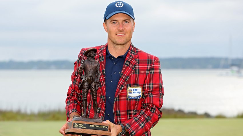 Jordan Spieth poses with the trophy after winning the RBC Heritage in a playoff at Harbor Town Golf Links on April 17, 2022 in Hilton Head Island, South Carolina.