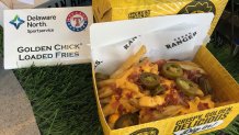 Golden Chick's signature battered fries loaded with Ricos Nacho Cheese, bacon bits and Ricos Jalapenos. Available at the Golden Chick stand at Section 128.