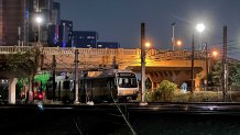 DART train passengers should expect delays in downtown Dallas Monday after a car went flying off a bridge overpass and onto train track equipment below, officials say.