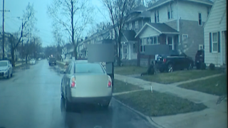 This screen grab from a Grand Rapids police cruiser's dashcam video shows an officer's confrontation with Patrick Lyoya, who fatally shot during a traffic stop.