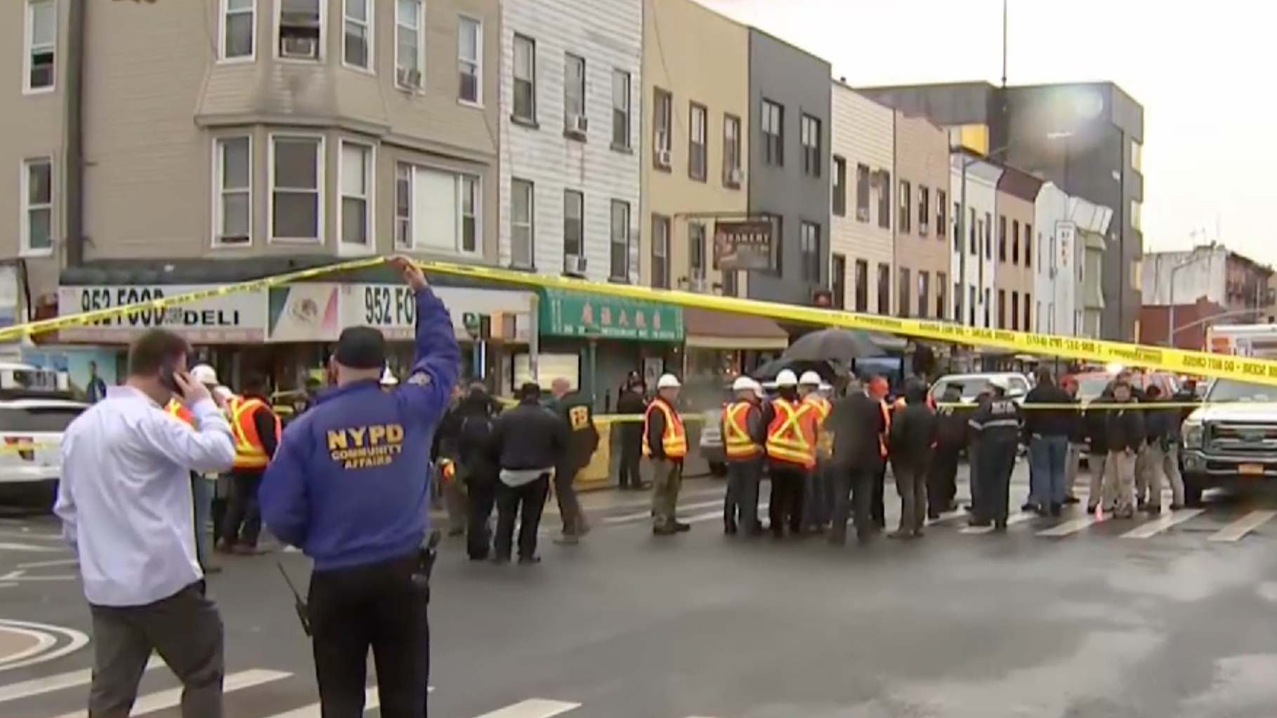 Police and first responders swarm the Brooklyn neighborhood of Sunset Park in New York, after multiple people were shot or hurt at the height of morning rush hour, April 12, 2022.