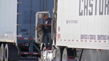 driver waits at a border checkpoint delay