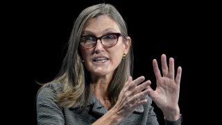 Catherine Wood, chief executive officer of ARK Investment Management LLC, speaks during the Milken Institute Global Conference in Beverly Hills, California, on Monday, Oct. 18, 2021.