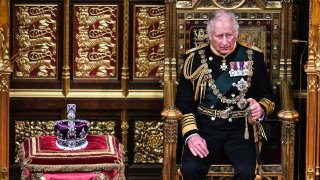 Britain’s Prince Charles, Prince of Wales, sits by the The Imperial State Crown in the House of Lords Chamber, during the State Opening of Parliament.