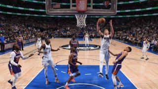 Dwight Powell #7 of the Dallas Mavericks drives to the basket against the Phoenix Suns during Game 3 of the 2022 NBA Playoffs Western Conference Semifinals on May 6, 2022 at the American Airlines Center in Dallas, Texas.