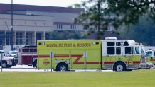 SANTA FE, TX - MAY 18: Emergency crews stage in the parking lot of Santa Fe High School where at least 10 students were killed on May 18, 2018 in Santa Fe, Texas. At least 10 people were killed when a gunman opened fire at Santa Fe High school. Police arrested a student suspect and detained a second person. 