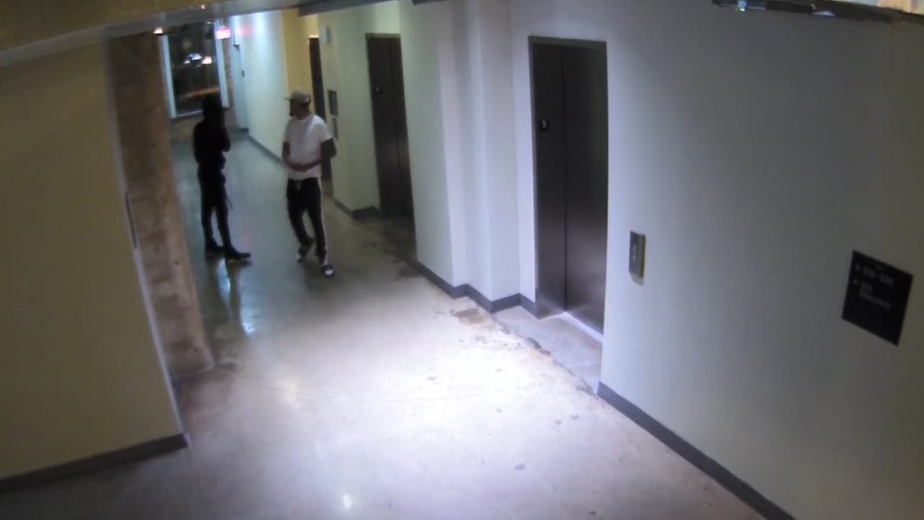 Two weeks after a former O.U football player was found shot dead in a downtown Dallas apartment, police have released images of the men they believe are responsible.
