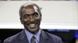 Former Dallas Cowboy Don Perkins smiles before a halftime ceremony during the team's NFL football game against the New York Giants on Sept. 20, 2009, in Arlington, Texas.