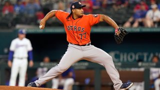 Houston Astros starting pitcher Luis Garcia throws during the first inning of a baseball game against the Texas Rangers in Arlington, Texas, Wednesday, June 15, 2022.