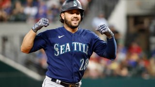Eugenio Suarez #28 of the Seattle Mariners celebrates after hitting a two-run home run against the Texas Rangers during the ninth inning at Globe Life Field on June 3, 2022 in Arlington, Texas.