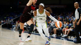 Arike Ogunbowale #24 of the Dallas Wings drives to the basket during the game against the Indiana Fever on June 23, 2022 at the College Park Center in Arlington, TX.