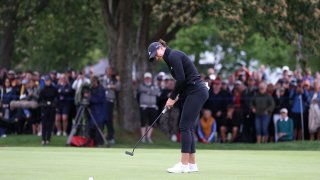 Linn Grant of Sweden putts on the 18th green