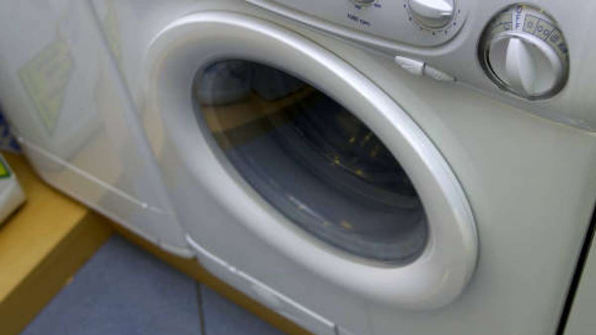 Boy, 8, Dies After Getting Wedged Between Washer and Dryer While(00)