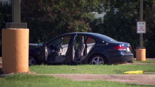 car with bullet holes