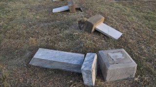 Crowley police say headstones dating from the 1800s were knocked over and destroyed by vandals at the city's historic cemetery Thursday night.