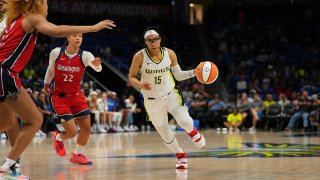 Allisha Gray #15 of the Dallas Wings drives to the basket during the game against the Washington Mystics on July 28, 2022 at the College Park Center in Arlington, Texas.